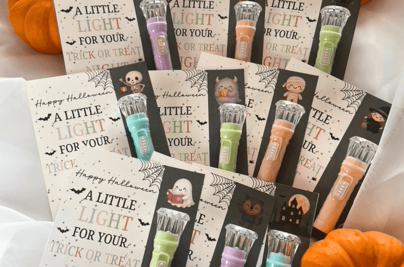 a little light for your trick or treat night favor card with flashlights favor cards